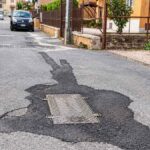 Pavona, via Parma con rappezzi sull’asfalto dopo i lavori per la fibra
